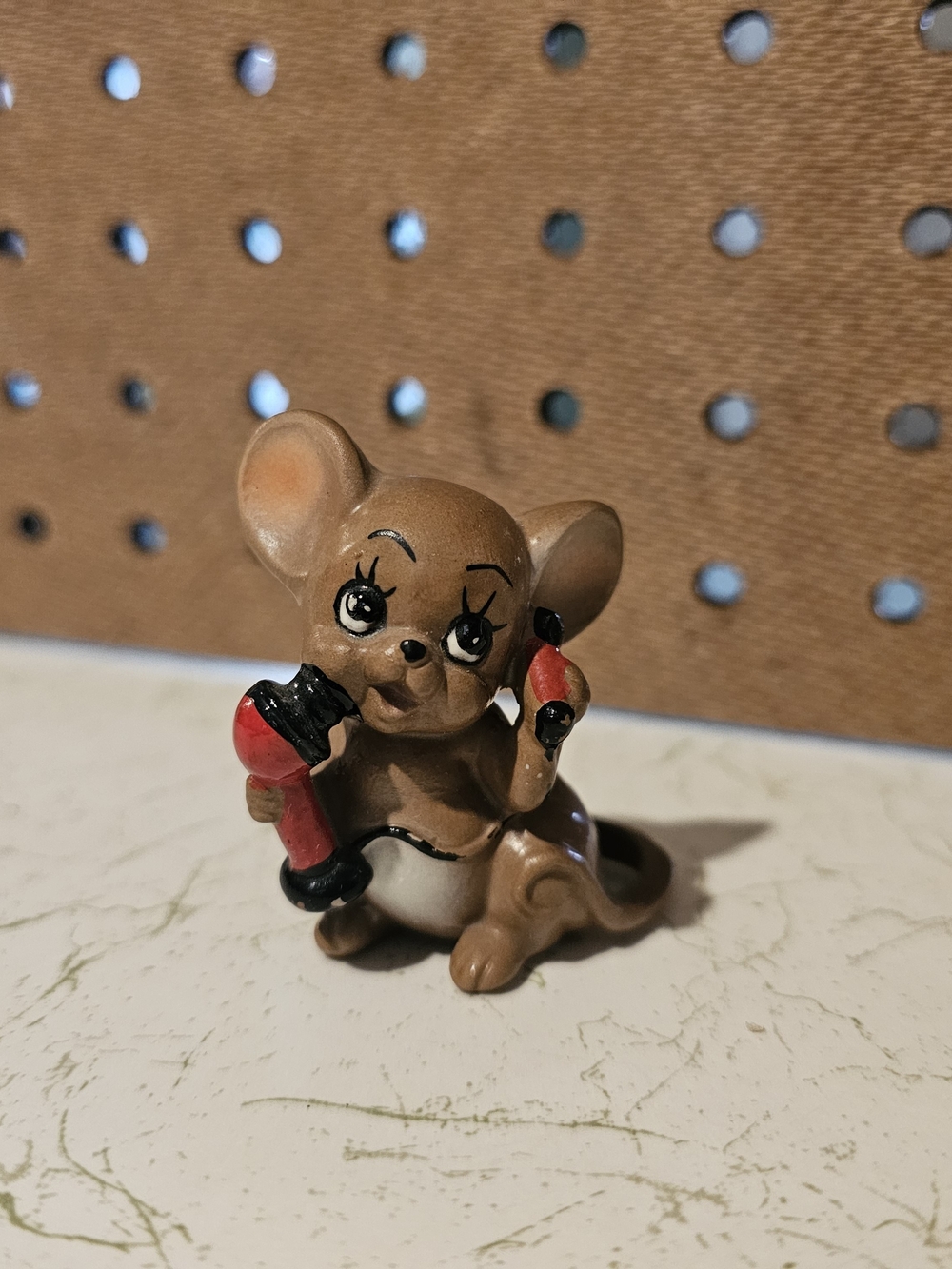 Brown Ceramic Mouse Figurine with Red Phone Decorative Accent